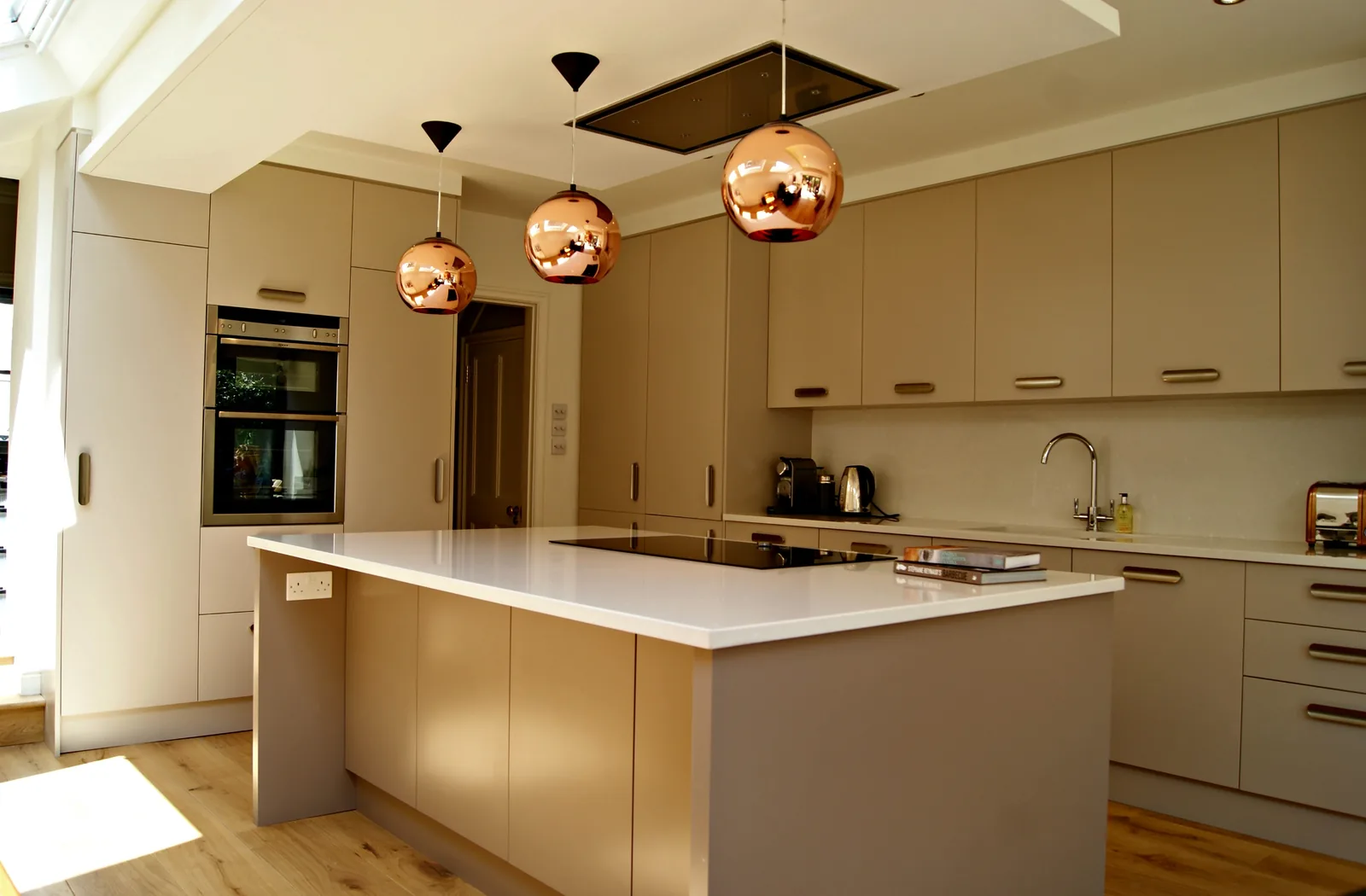 Premium fitted kitchen with polished worktops and clean cabinetry